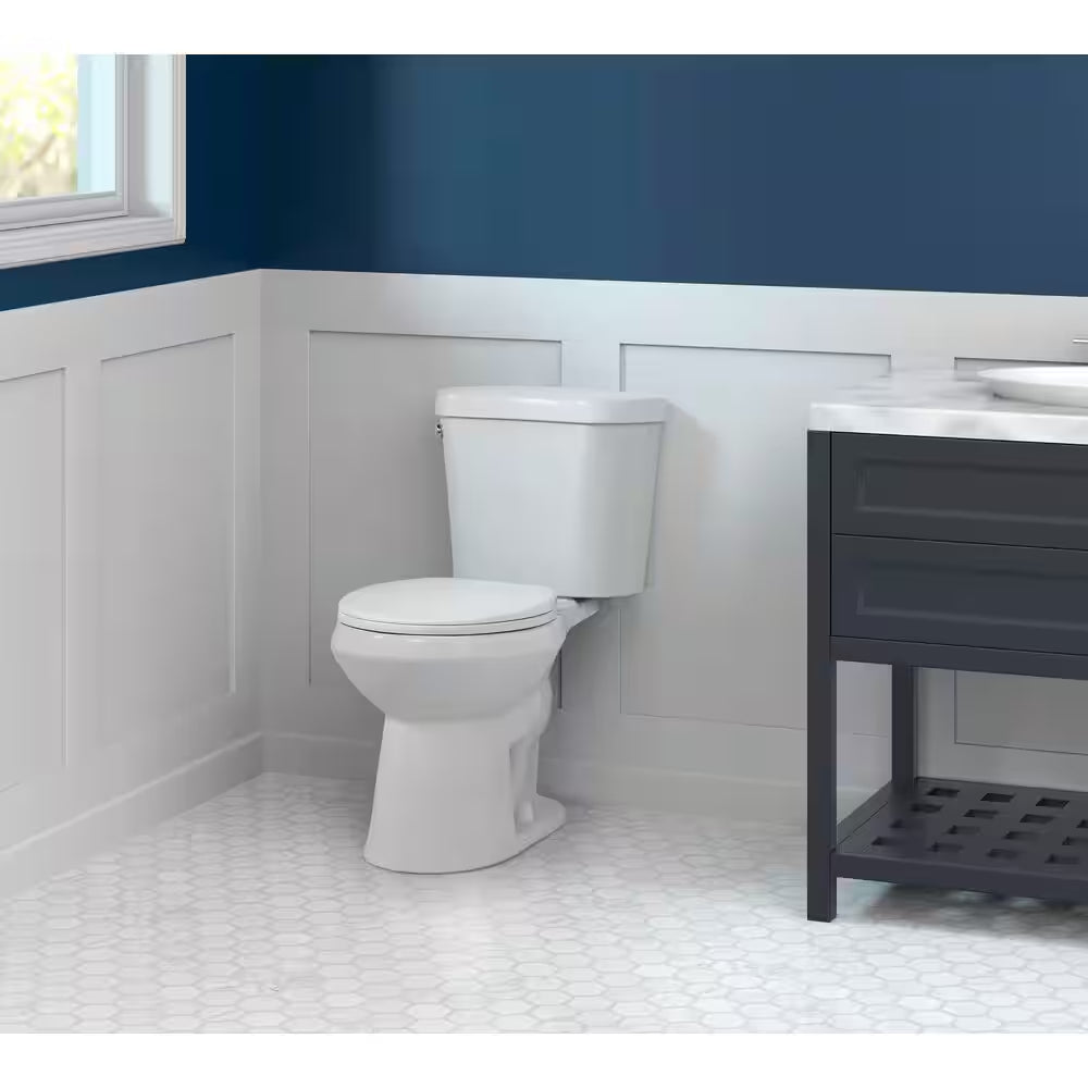 12 Inch Rough in Two-Piece 1.28 GPF Single Flush round Toilet in White Seat Included