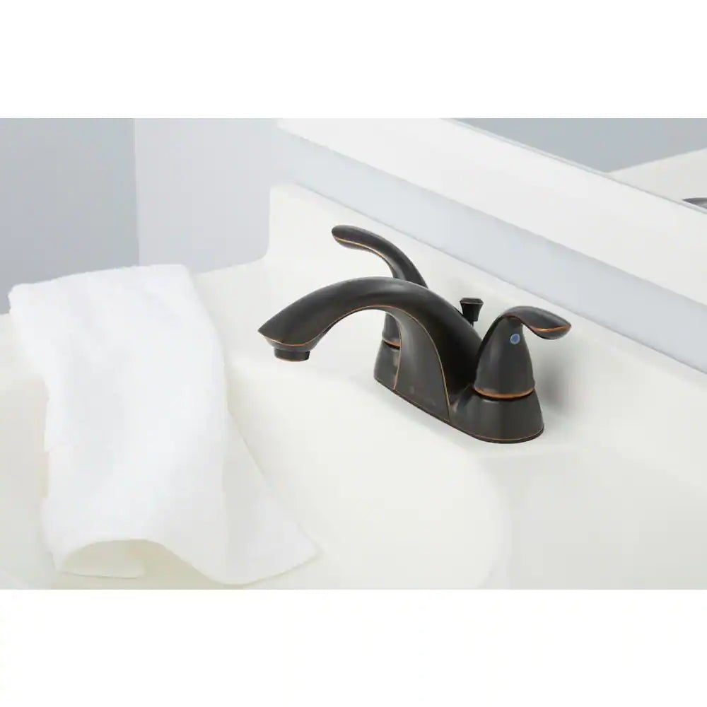 Builders 4 In. Centerset Double Handle Low-Arc Bathroom Faucet in Bronze